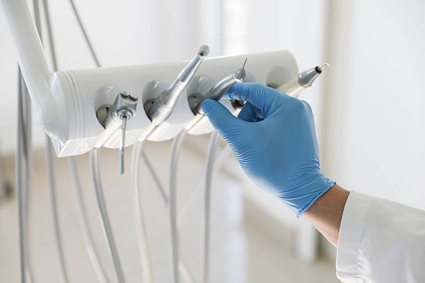 Professional Root Canal Treatment technician working in Louisburg, KS